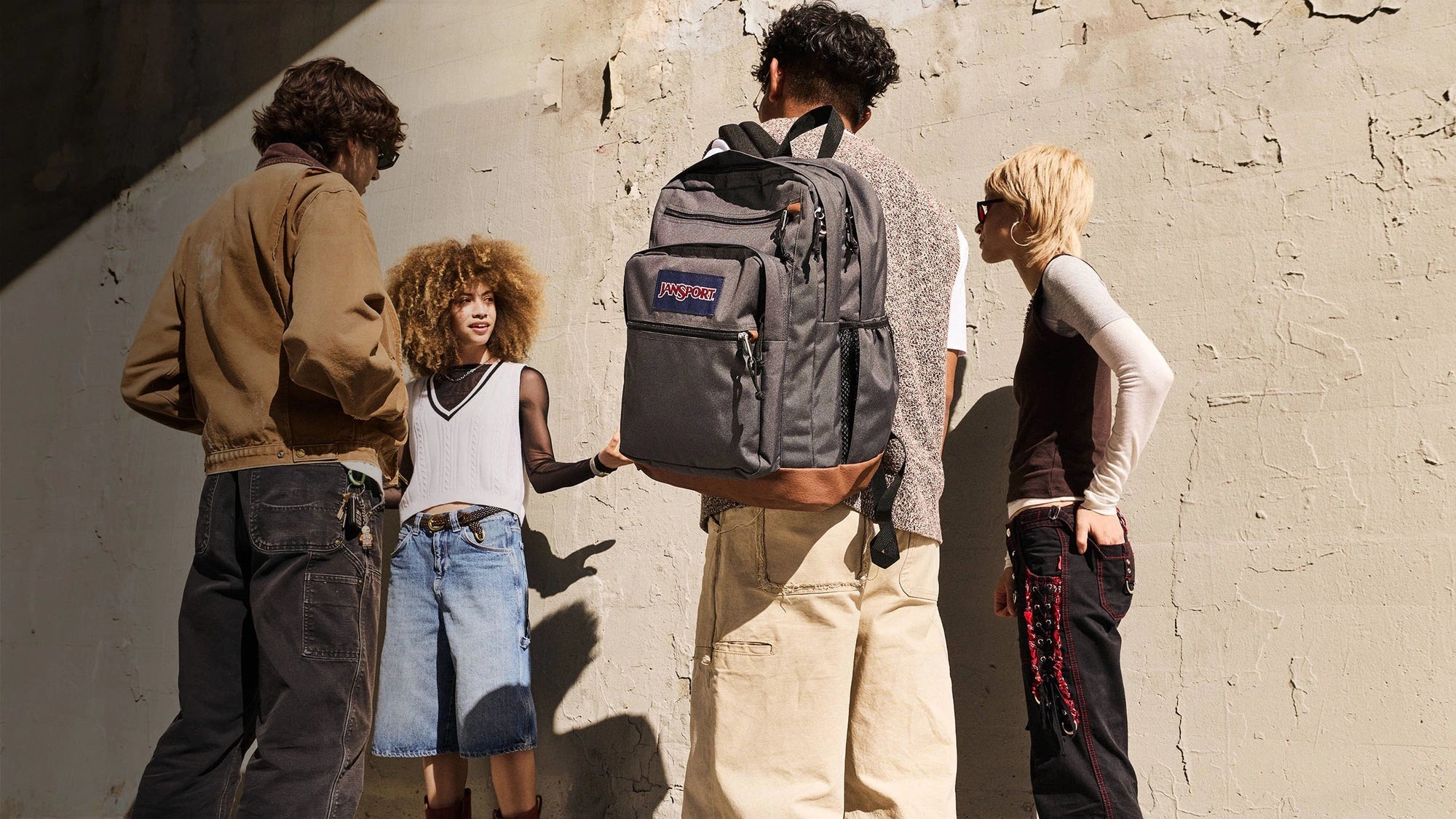 Friends with a JanSport Cool Student backpack